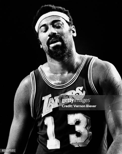 Wilt Chamberlain of the Los Angeles Lakers walks on the court during a game against the Milwaukee Bucks during the 1970 season at the MECCA Arena in...