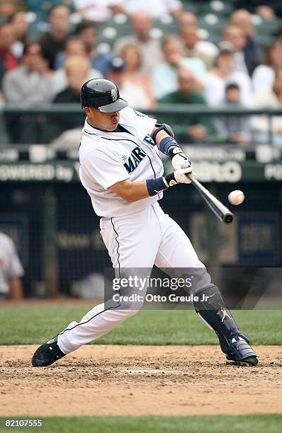 Kenji Johjima of the Seattle Mariners bats during their MLB game against the Boston Red Sox on July 23, 2008 at Safeco Field in Seattle, Washington.