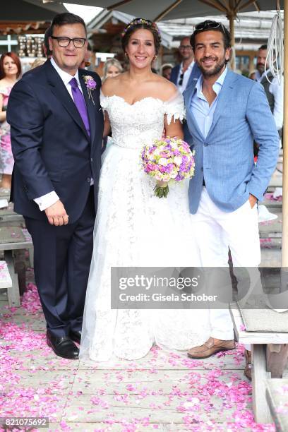 Bridegroom Torsten Koch and his wife bride Annika Koch and Elyas M'Barek during the wedding of Torsten Koch and Annika Hofmann at Wiesergut Alm on...