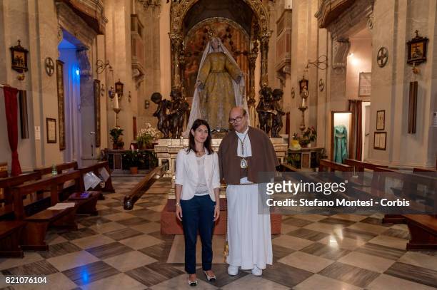 The Mayor of Rome Virginia Raggi with the Peter Solfizi governor of the Venerable Brotherhood of the Blessed Sacrament and Maria del Carmine in...