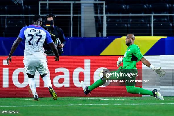 United States's forward Jozy Altidore scores agains Costa Rica's goalkeeper Patrick Pemberton during second half of the Costa Rica vs. United States...