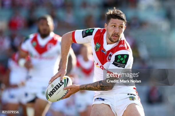 Gareth Widdop of the Dragons looks to pass during the round 20 NRL match between the St George Illawarra Dragons and the Manly Sea Eagles at WIN...
