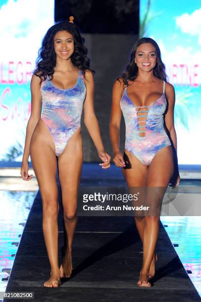 Models walk the runway at the Courtney Allegra fashion show during the Art Hearts Fashion at Miami Swim Week at SLS Hyde Beach on July 22, 2017 in...