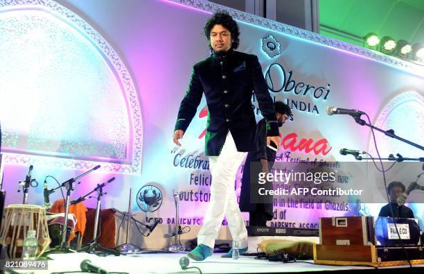 In this photograph taken on July 22, 2017 Indian Bollywood singer Papon attends the Ghazal music festival 'Khazana' to raise funds for cancer...
