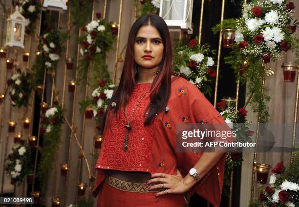In this photograph taken on July 22, 2017 Indian Bollywood singer Sona Mohapatra pose for a picture at the Ghazal music festival 'Khazana' to raise...