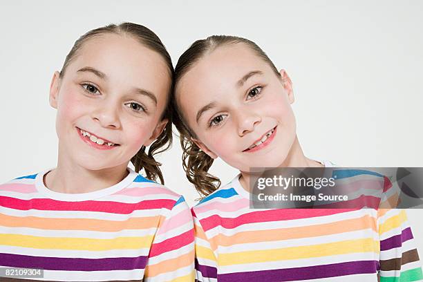 209 Identical Twins On White Stock Photos, High-Res Pictures, and