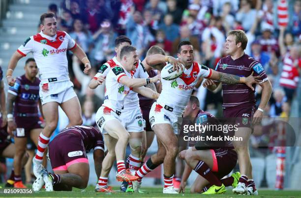 Paul Vaughan of the Dragons celebrates his try during the round 20 NRL match between the St George Illawarra Dragons and the Manly Sea Eagles at WIN...