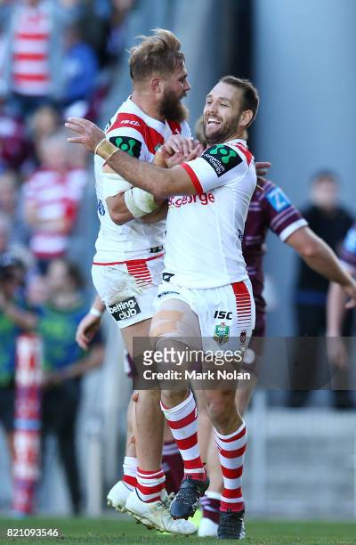 Jason Nightingale of the Dragons celebrates scoring a try during the round 20 NRL match between the St George Illawarra Dragons and the Manly Sea...