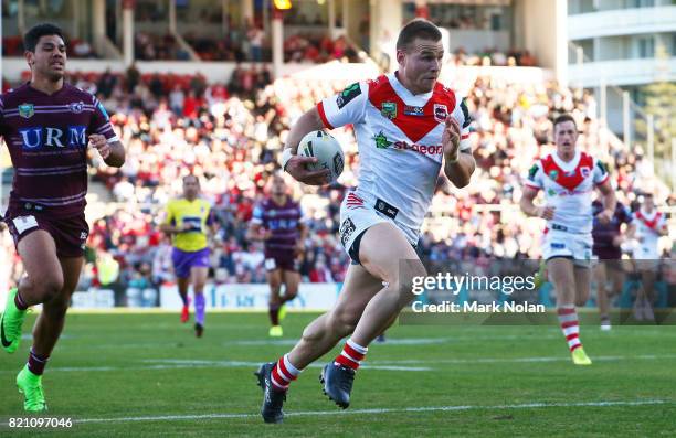 Euan Aitken of the Dragons makes a line break to score during the round 20 NRL match between the St George Illawarra Dragons and the Manly Sea Eagles...