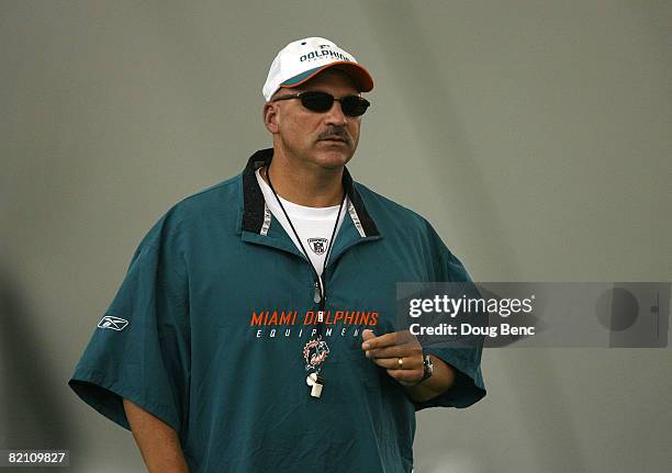 Head coach Tony Sparano of the Miami Dolphins watches his team during training camp at Nova Southeastern University on July 29, 2008 in Davie,...