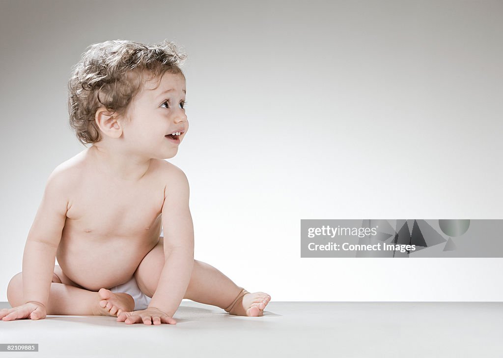 A baby boy laughing