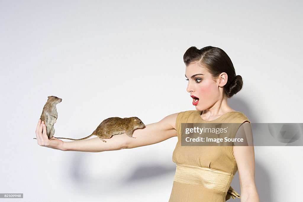 Woman with rats on her arm