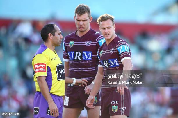 Daly Cherry-Evans of the Eagles talks with referee Ashley Klein during the round 20 NRL match between the St George Illawarra Dragons and the Manly...