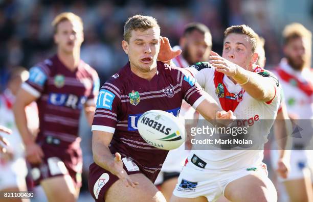 Tom Trbojevic of the Eagles offloads during the round 20 NRL match between the St George Illawarra Dragons and the Manly Sea Eagles at WIN Stadium on...