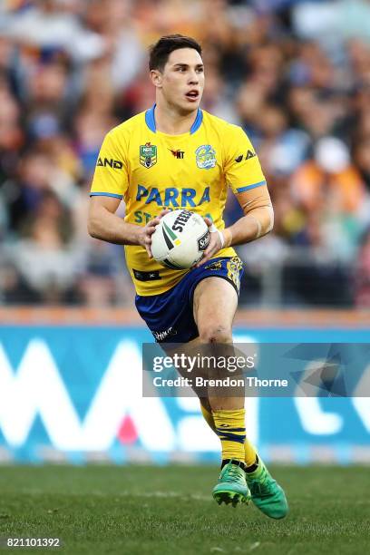 Mitchell Moses of the Eels runs the ball during the round 20 NRL match between the Wests Tigers and the Parramatta Eels at ANZ Stadium on July 23,...