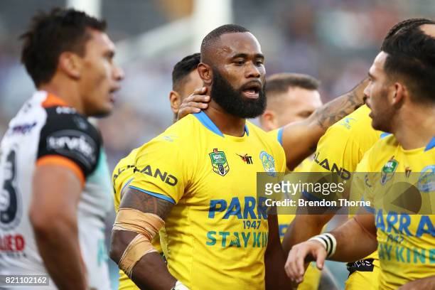 Semi Radrada of the Eels celebrates with team mates after scoring a try during the round 20 NRL match between the Wests Tigers and the Parramatta...