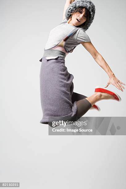 japanese woman jumping - fashion woman jumping stock-fotos und bilder