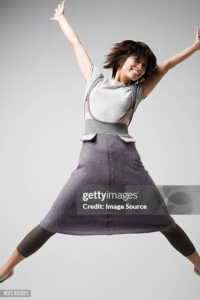 japanese woman star jumping - jumping jack stock pictures, royalty-free photos & images
