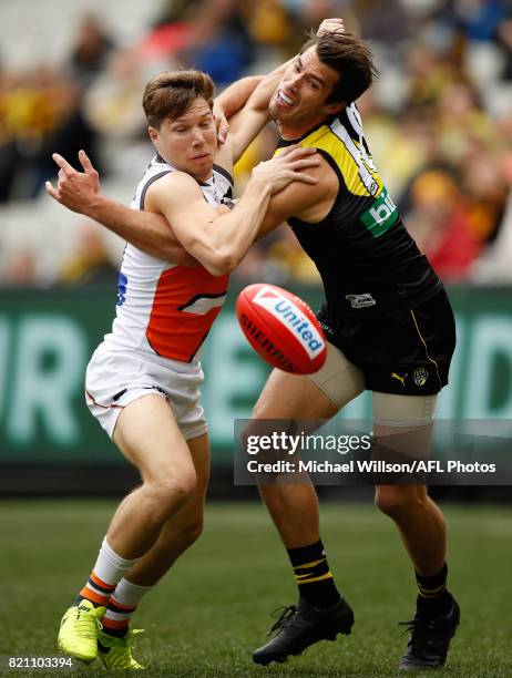 Toby Greene of the Giants and Alex Rance of the Tigers compete for the ball during the 2017 AFL round 18 match between the Richmond Tigers and the...