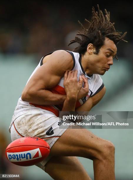 Tendai Mzungu of the Giants drops a mark during the 2017 AFL round 18 match between the Richmond Tigers and the GWS Giants at the Melbourne Cricket...