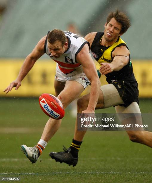 Steve Johnson of the Giants and Alex Rance of the Tigers compete for the ball during the 2017 AFL round 18 match between the Richmond Tigers and the...