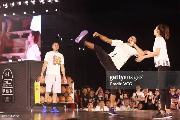 American basketball player Stephen Curry attends an activity at Imperial Ancestral Temple during his visit in Beijing on July 22, 2017 in Beijing,...