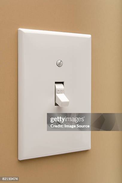 light switch - lichtschalter stock-fotos und bilder