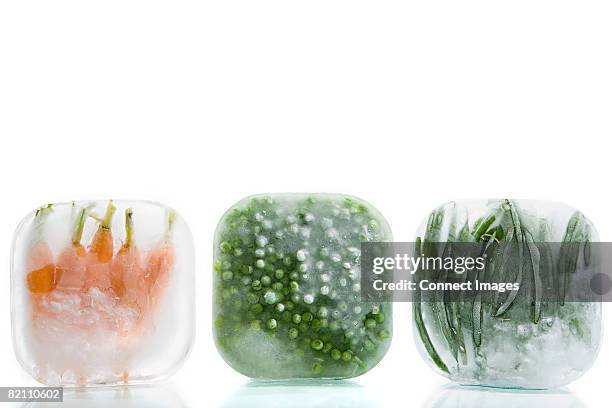 frozen carrots peas and green beans - frozen vegetables stock pictures, royalty-free photos & images