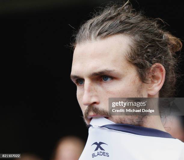 Phil Davis of the Giants walks out to the field of play during the round 18 AFL match between the Richmond Tigers and the Greater Western Sydney...