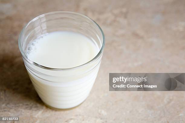 milk in a glass - glass of milk stock pictures, royalty-free photos & images