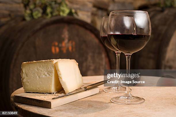 cheese and red wine - cheese wine stock-fotos und bilder