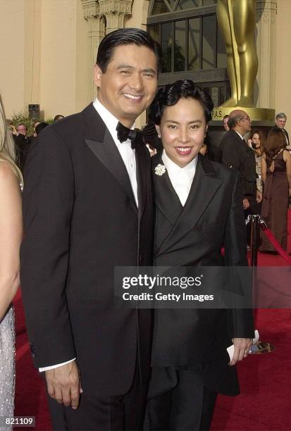 Actor Chow Yun-Fat and his wife, Jasmine arrive for the 73rd Annual Academy Awards March 25, 2001 at the Shrine Auditorium in Los Angeles. Chow is...