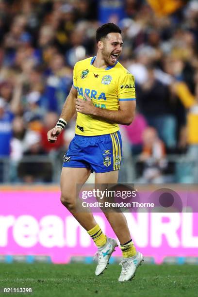 Corey Norman of the Eels celebrates kicking the winning field goal during the round 20 NRL match between the Wests Tigers and the Parramatta Eels at...