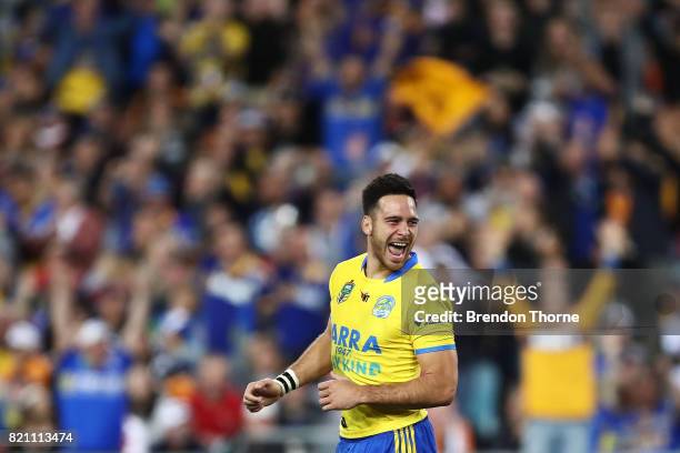 Corey Norman of the Eels celebrates kicking the winning field goal during the round 20 NRL match between the Wests Tigers and the Parramatta Eels at...