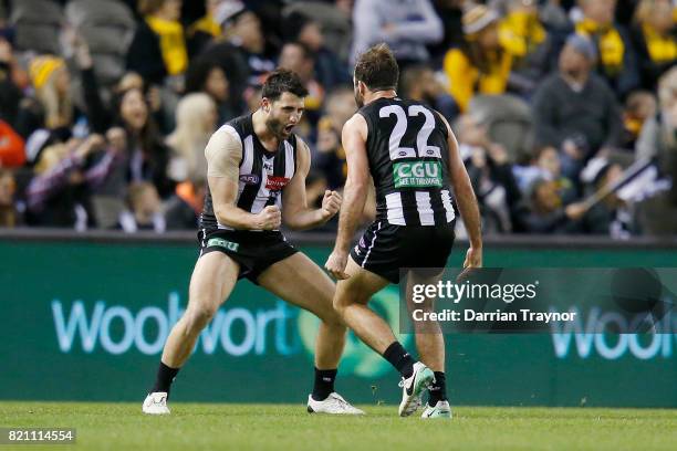 Alex Fasolo of the Magpies celebrates kicking the final goal during the round 18 AFL match between the Collingwood Magpies and the West Coast Eagles...