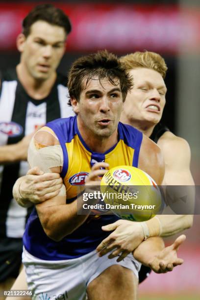 Andrew Gaff of the Eagles handballs during the round 18 AFL match between the Collingwood Magpies and the West Coast Eagles at Etihad Stadium on July...