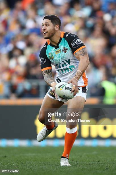 Malakai Watene-Zelezniak of the Tigers runs the ball during the round 20 NRL match between the Wests Tigers and the Parramatta Eels at ANZ Stadium on...