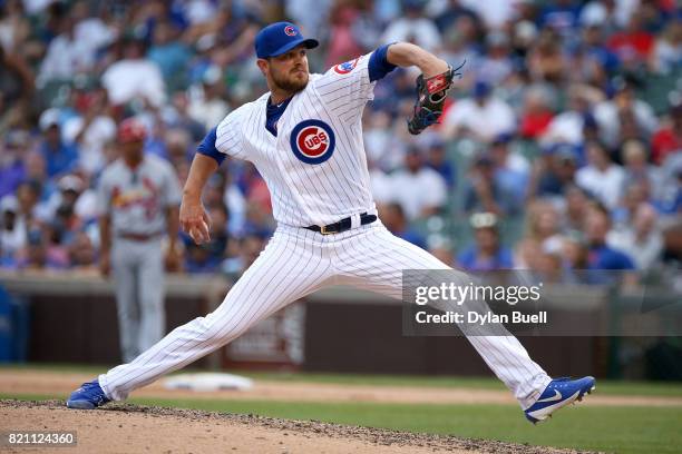 Justin Grimm of the Chicago Cubs pitches in the eighth inning against the St. Louis Cardinals at Wrigley Field on July 21, 2017 in Chicago, Illinois.