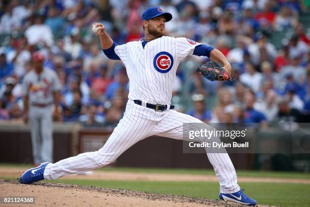 Justin Grimm of the Chicago Cubs pitches in the eighth inning against the St. Louis Cardinals at Wrigley Field on July 21, 2017 in Chicago, Illinois.