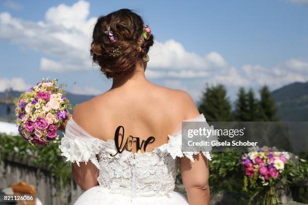 Bride Annika Koch during the wedding of Torsten Koch and Annika Hofmann at Wiesergut Alm on July 22, 2017 in Saalbach-Hinterglemm, Austria.