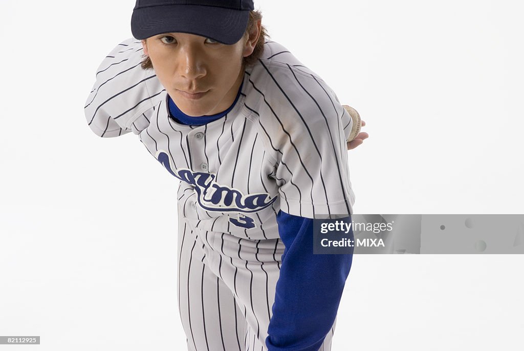 Pitcher preparing to throw a ball