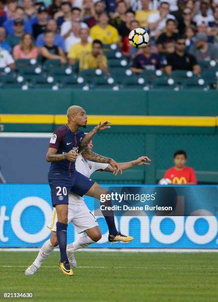 Juan Iturbe of AS Roma collides with Layvin Kurzawa of Paris Saint-Germain after heading the ball during the first half at Comerica Park on July 19,...