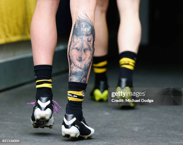 The leg tattoo of Nathan Broad of the Tigers is seen during the round 18 AFL match between the Richmond Tigers and the Greater Western Sydney Giants...