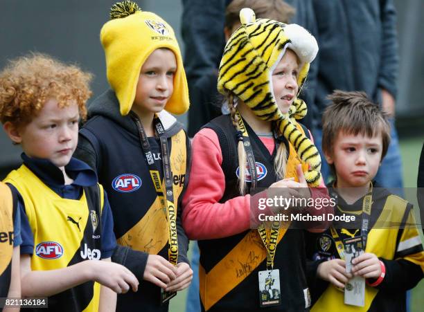 Tigers fans show their support during the round 18 AFL match between the Richmond Tigers and the Greater Western Sydney Giants at Melbourne Cricket...