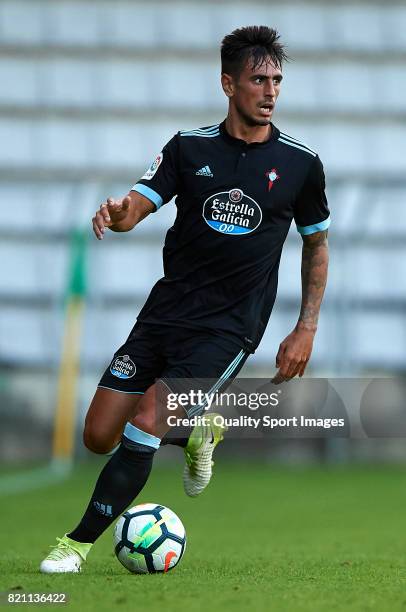 David Costas of Celta de Vigo runs with the ball during the pre-season friendly match between Celta de Vigo and Racing de Ferrol at A Malata Stadium...