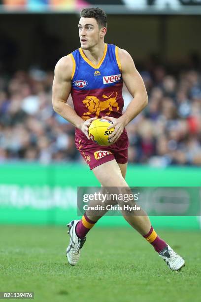 Daniel McStay of the Lions kicks during the round 18 AFL match between the Brisbane Lions and the Carlton Blues at The Gabba on July 23, 2017 in...