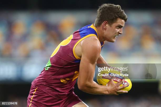 Jarrod Berry of the Lions runs the ball during the round 18 AFL match between the Brisbane Lions and the Carlton Blues at The Gabba on July 23, 2017...