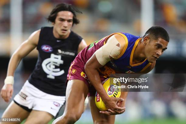 Cedric Cox of the Lions takes a mark during the round 18 AFL match between the Brisbane Lions and the Carlton Blues at The Gabba on July 23, 2017 in...