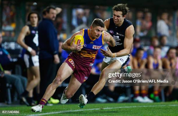 Dayne Zorko of the Lions runs with the ball during the round 18 AFL match between the Brisbane Lions and the Carlton Blues at The Gabba on July 23,...