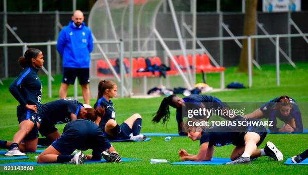 France's midfielder Gaetane Thiney stretches during a training during the UEFA Women's Euro 2017 football tournament in Zwijndrecht on July 23, 2017.